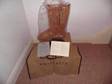 UGG BOOTS,  tall chestnut,  size 4.5 Brand new in box with....