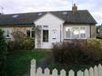 Contemporary style semi detached bungalow in tucked away cul de sac location.