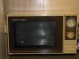 SHARP MICROWAVE oven Micro oven for sale! Old but full....
